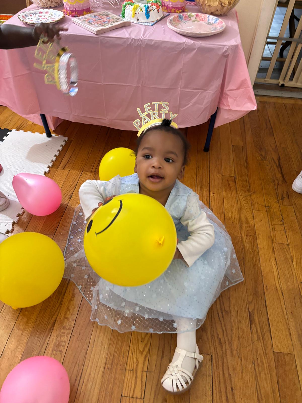 A joyful child at El Elyon Bee’s Daycare