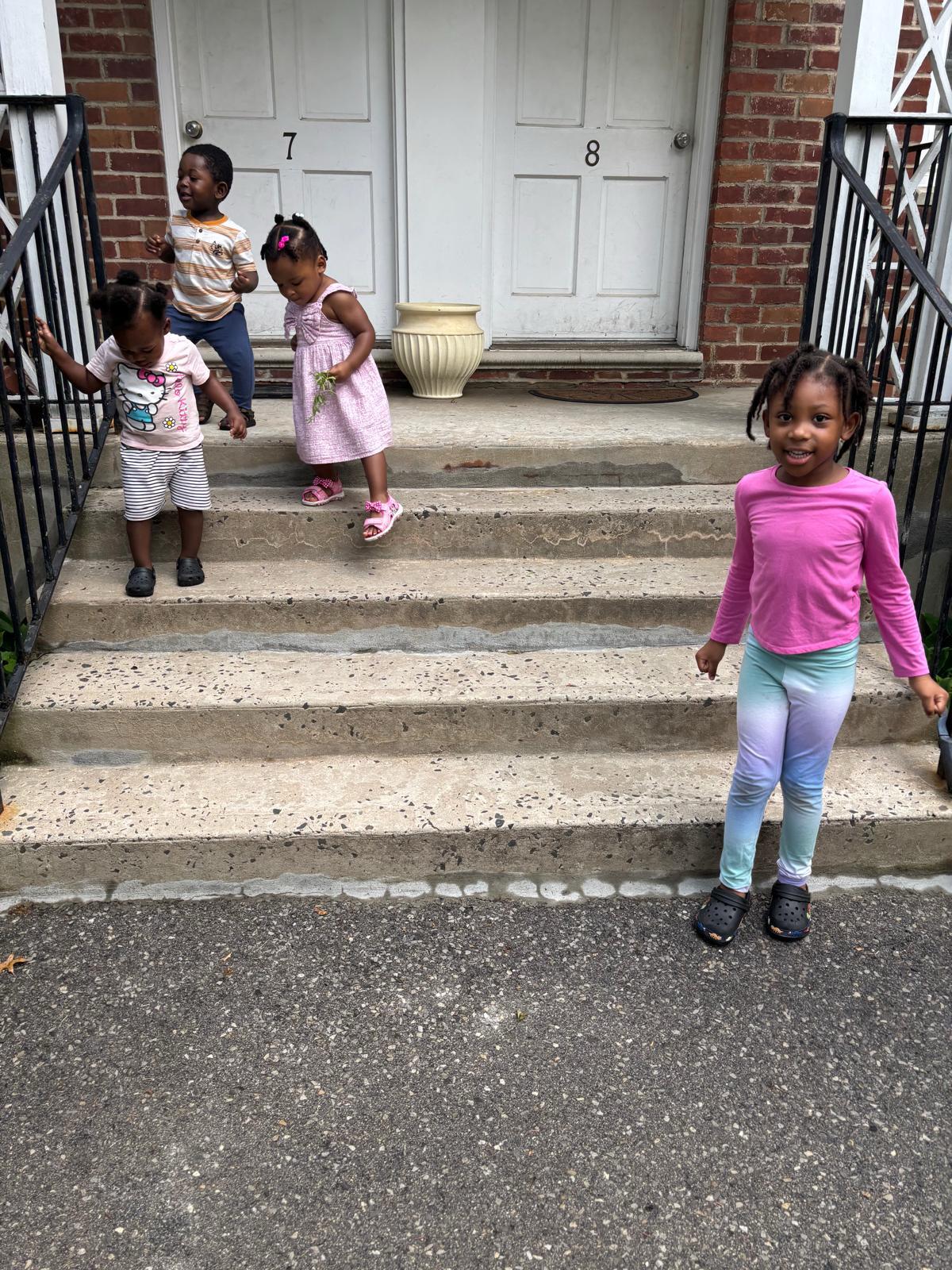 Children at the entrance of the daycare home